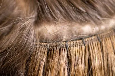 Echthaartressen Grefrath schonend vernäht ohne Kleber bei cut74